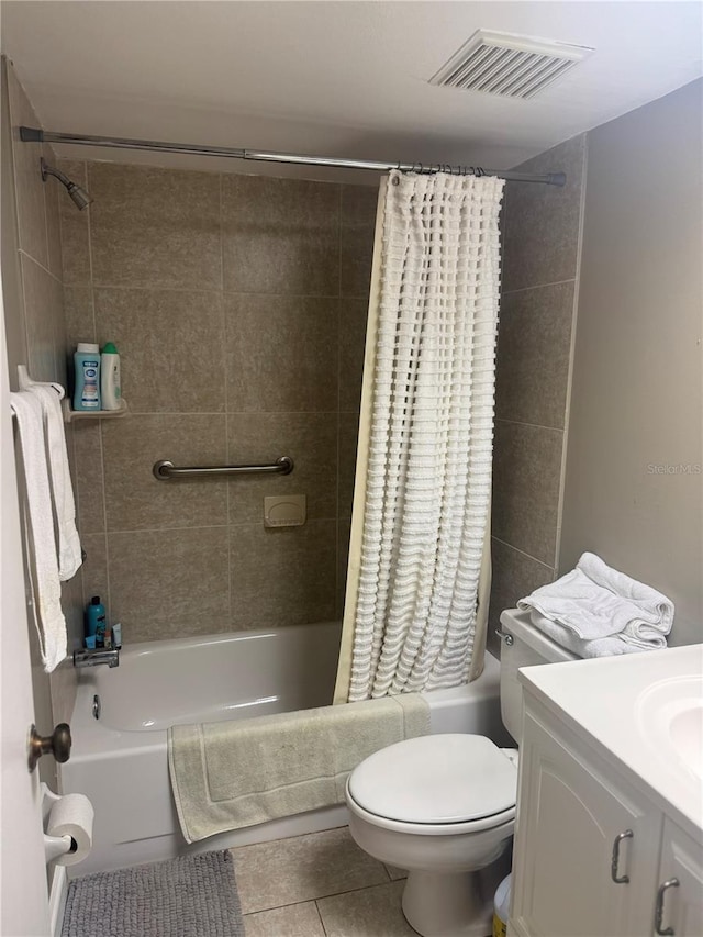 full bathroom featuring tile patterned flooring, vanity, shower / bath combination with curtain, and toilet