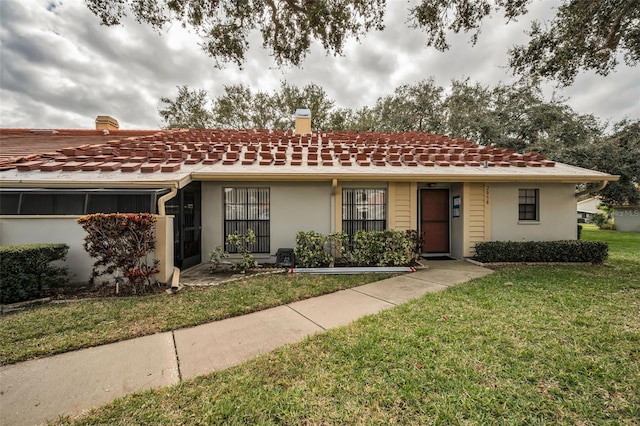 view of front of house with a front yard