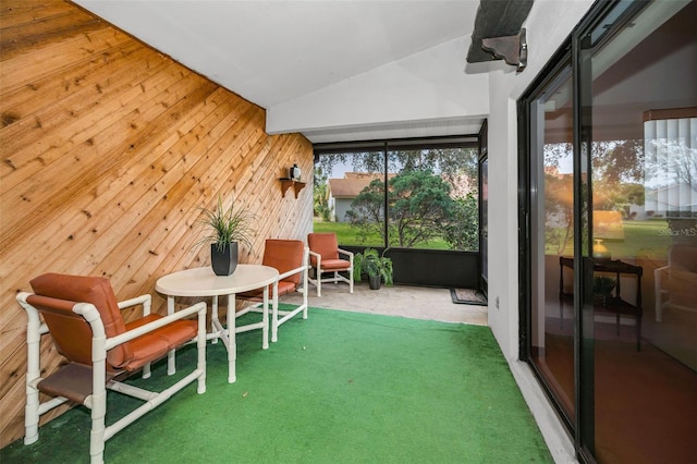 sunroom with lofted ceiling