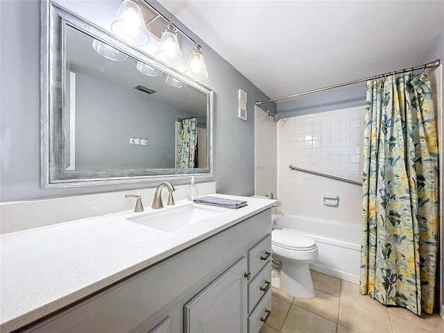 full bathroom with toilet, shower / bath combo, vanity, and tile patterned floors