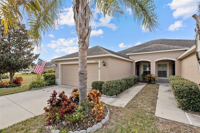 single story home featuring a porch and a garage