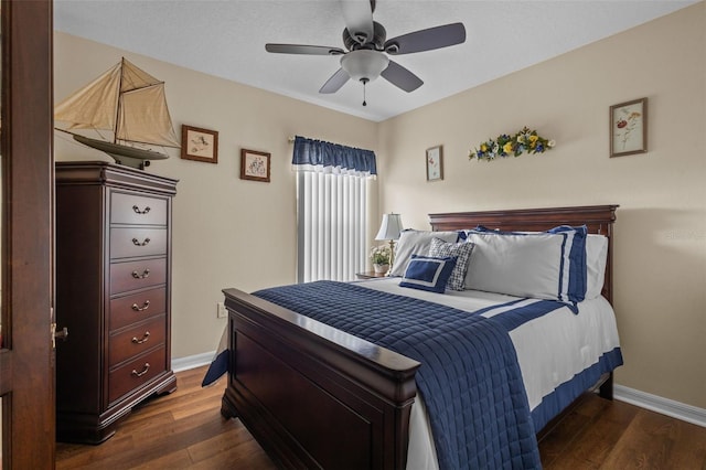 bedroom featuring ceiling fan and dark wood-type flooring