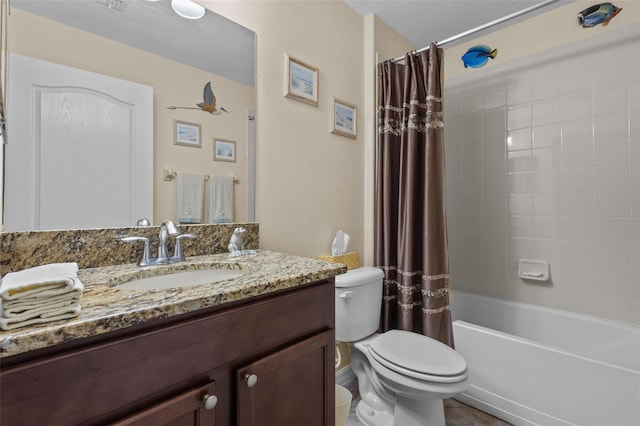 full bathroom featuring shower / bath combo with shower curtain, vanity, and toilet