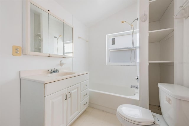 full bathroom with tile patterned flooring, vanity, toilet, and  shower combination