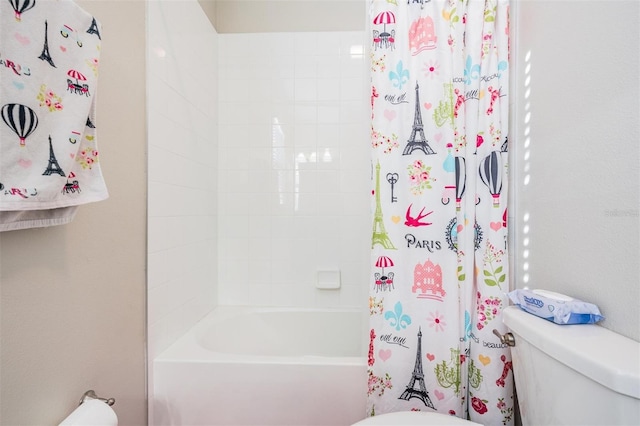 bathroom with toilet and shower / tub combo with curtain