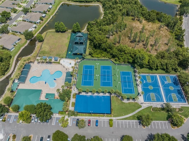 birds eye view of property featuring a water view