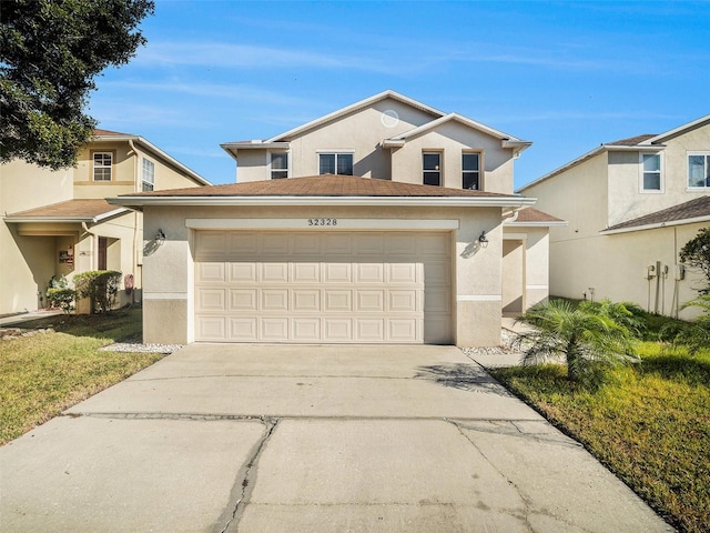 front of property with a garage