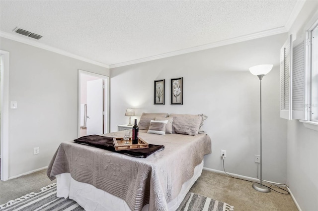 bedroom with light colored carpet, a textured ceiling, and ornamental molding