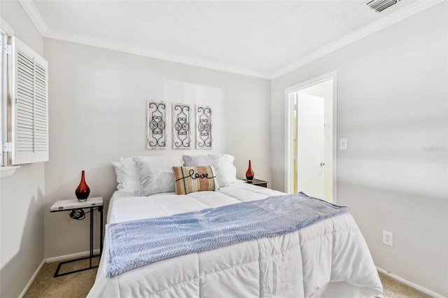 carpeted bedroom featuring crown molding