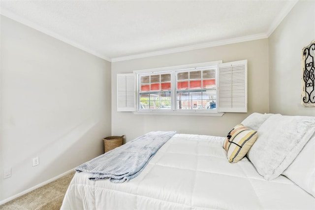 bedroom with carpet and crown molding