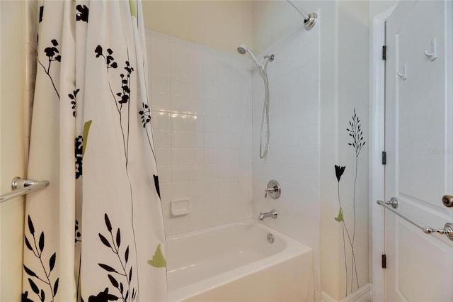 bathroom with shower / tub combo