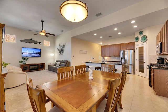 dining area featuring a ceiling fan, light tile patterned floors, recessed lighting, and visible vents