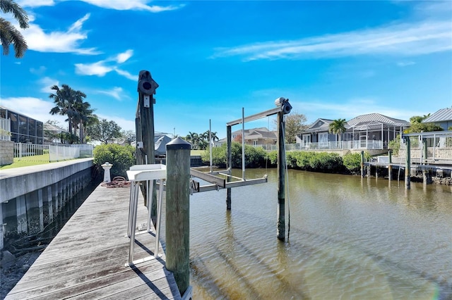 dock area with a water view