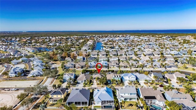 birds eye view of property with a residential view