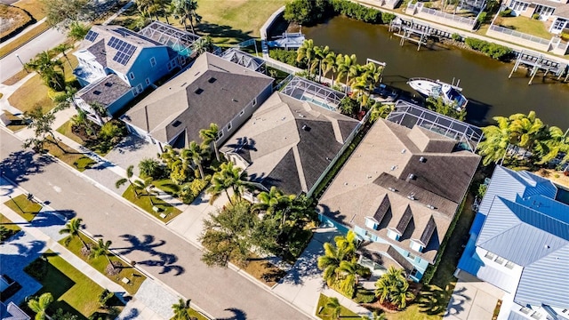 aerial view with a residential view and a water view