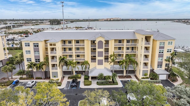 view of building exterior with a water view