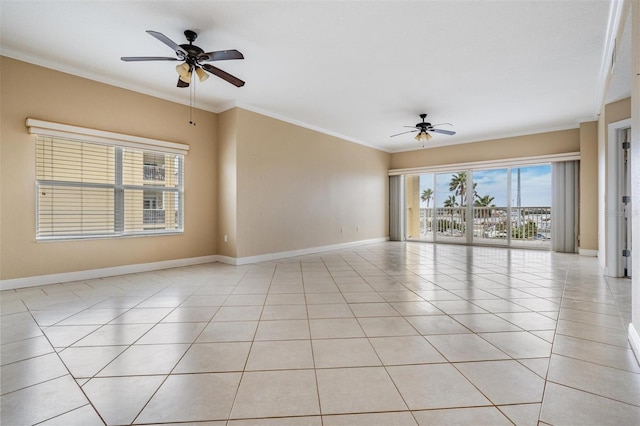 unfurnished room featuring light tile patterned floors, ceiling fan, and ornamental molding