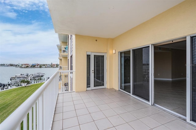 balcony featuring a water view