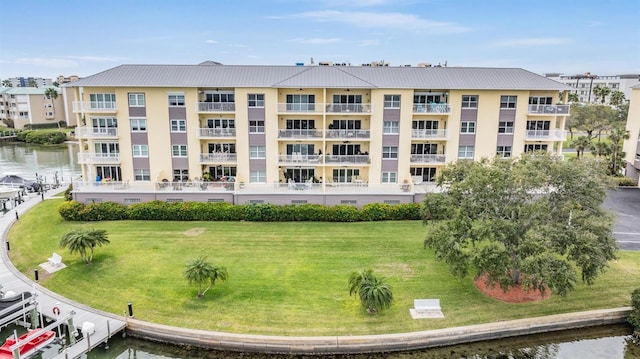 view of building exterior featuring a water view