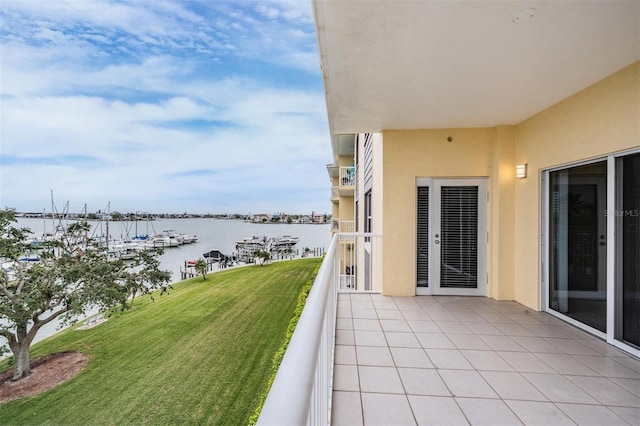 balcony featuring a water view