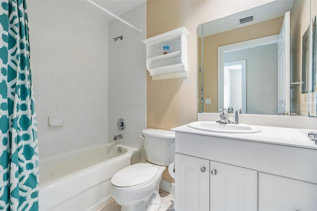 full bathroom featuring vanity, toilet, and shower / tub combo