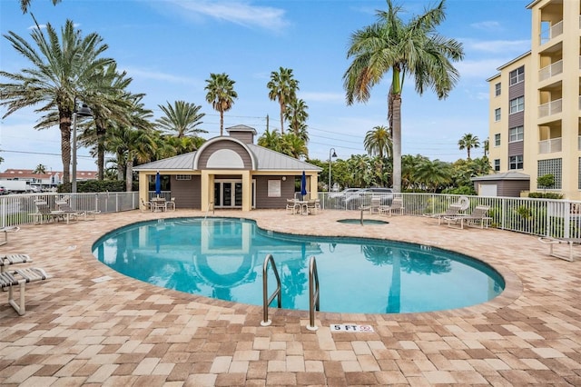 view of pool featuring a patio area