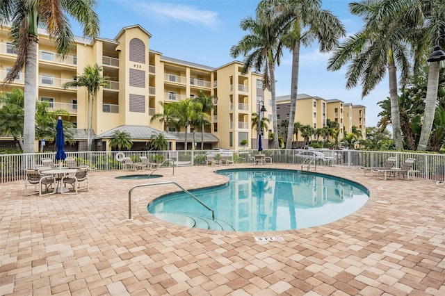 view of swimming pool with a patio area