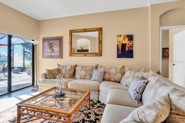 living room featuring crown molding