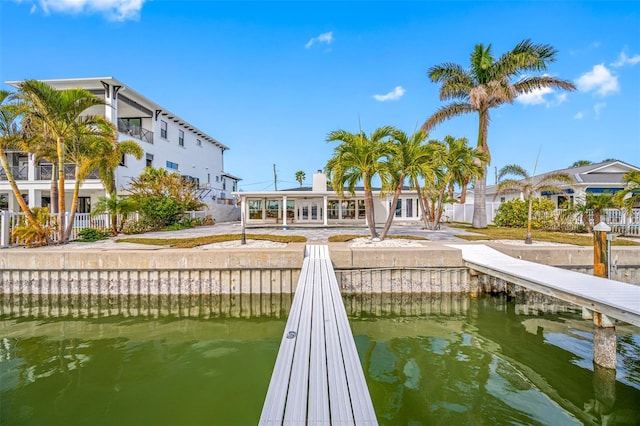 dock area featuring a water view