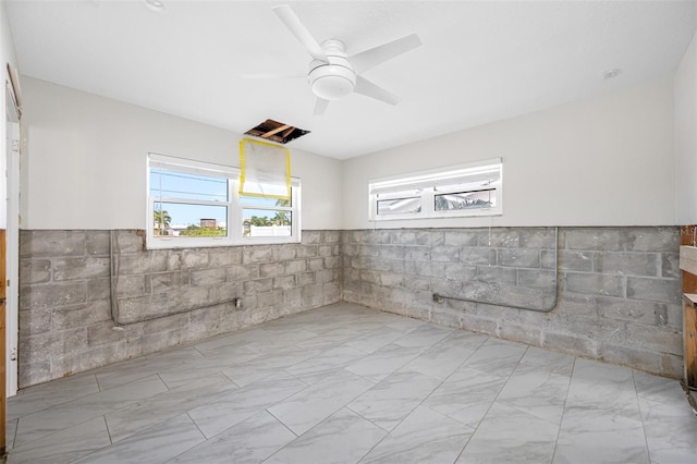 bathroom featuring ceiling fan and vanity