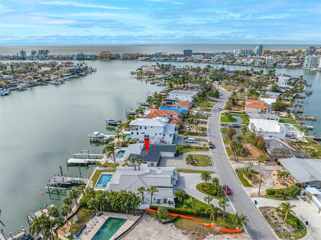 bird's eye view with a water view