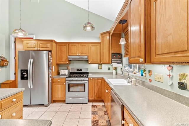 kitchen with high vaulted ceiling, hanging light fixtures, sink, light tile patterned floors, and appliances with stainless steel finishes