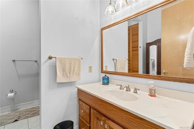 bathroom featuring tile patterned floors and vanity