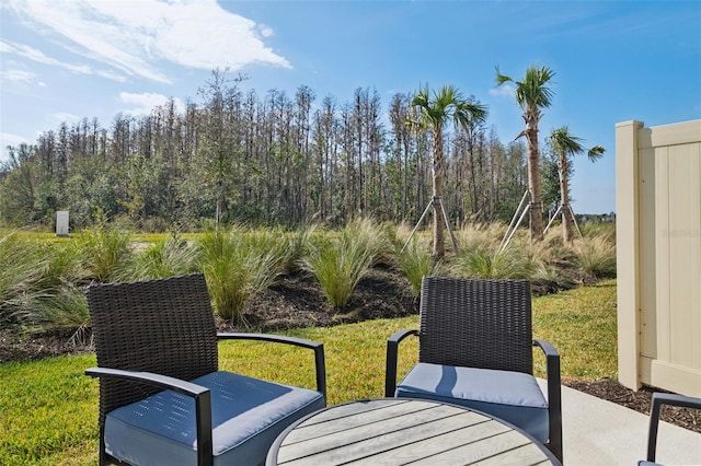 view of patio featuring outdoor dining area