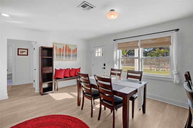 dining room featuring light wood-type flooring