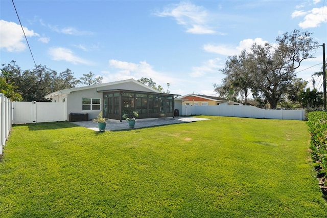 view of yard with a patio area and a sunroom