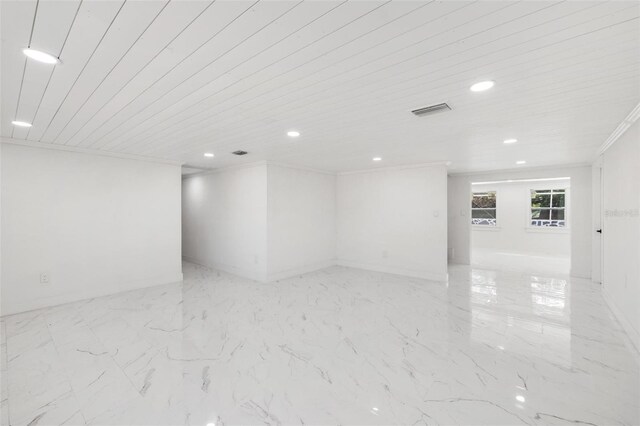 spare room with wooden ceiling and ornamental molding