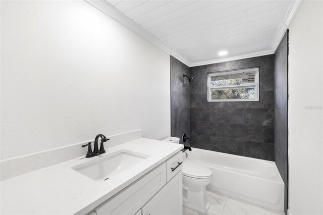 full bathroom featuring vanity, toilet, and tiled shower / bath