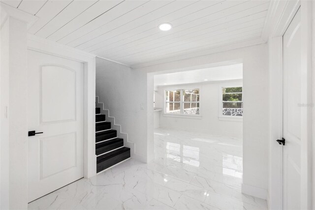 stairs featuring wood ceiling