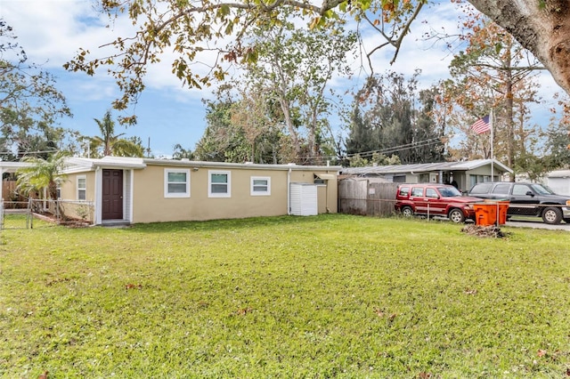 view of front of home with a front lawn