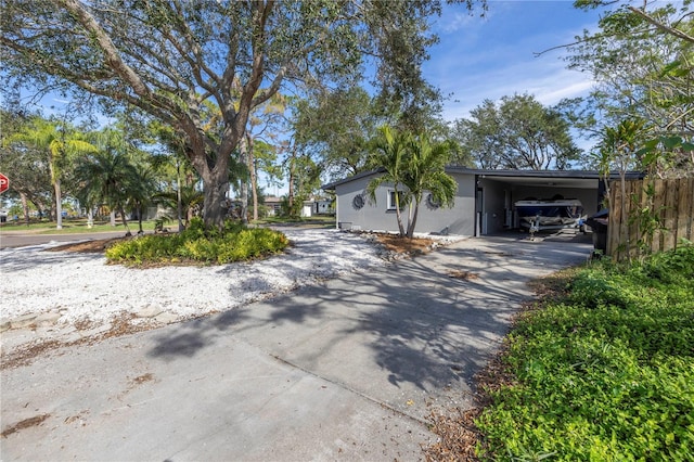 exterior space featuring a carport