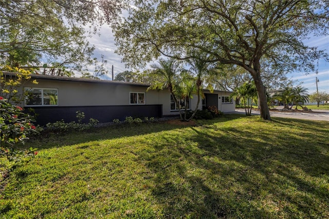 view of front of home with a front yard