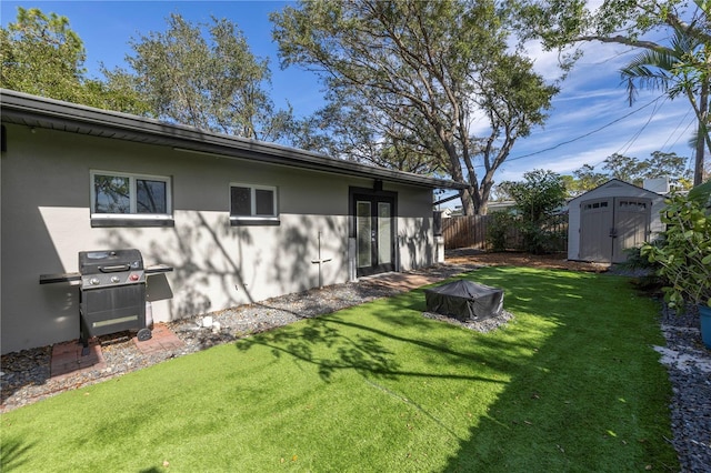 view of yard with a storage shed