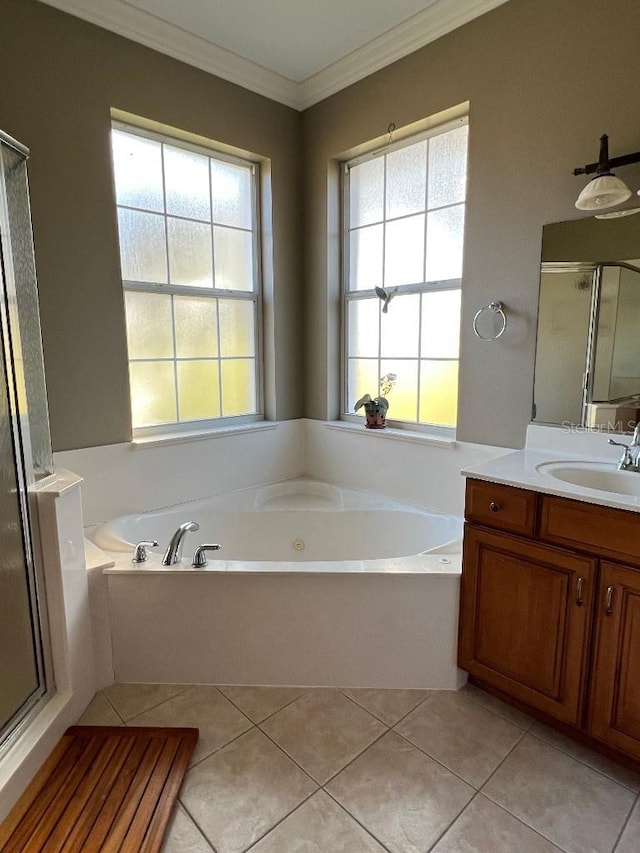 bathroom with independent shower and bath, vanity, tile patterned floors, and ornamental molding