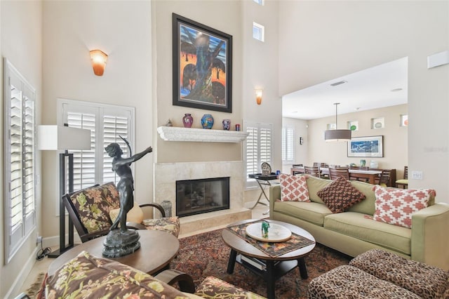 living room with a high ceiling