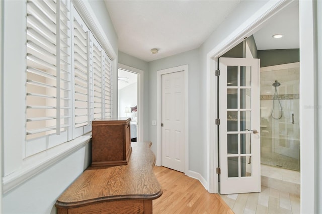 hallway featuring hardwood / wood-style flooring