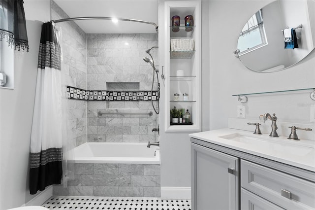 bathroom with vanity and shower / bath combination with curtain