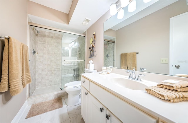 bathroom with toilet, a shower with door, and vanity