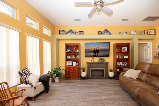 living room featuring ceiling fan