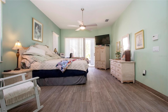 bedroom featuring light hardwood / wood-style flooring and ceiling fan